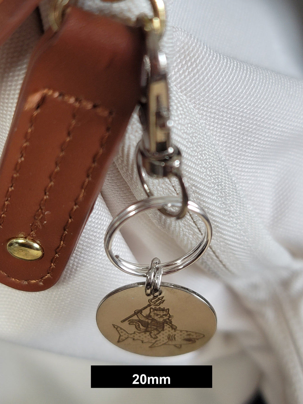 Misty on her shark at sea Engraved Fob