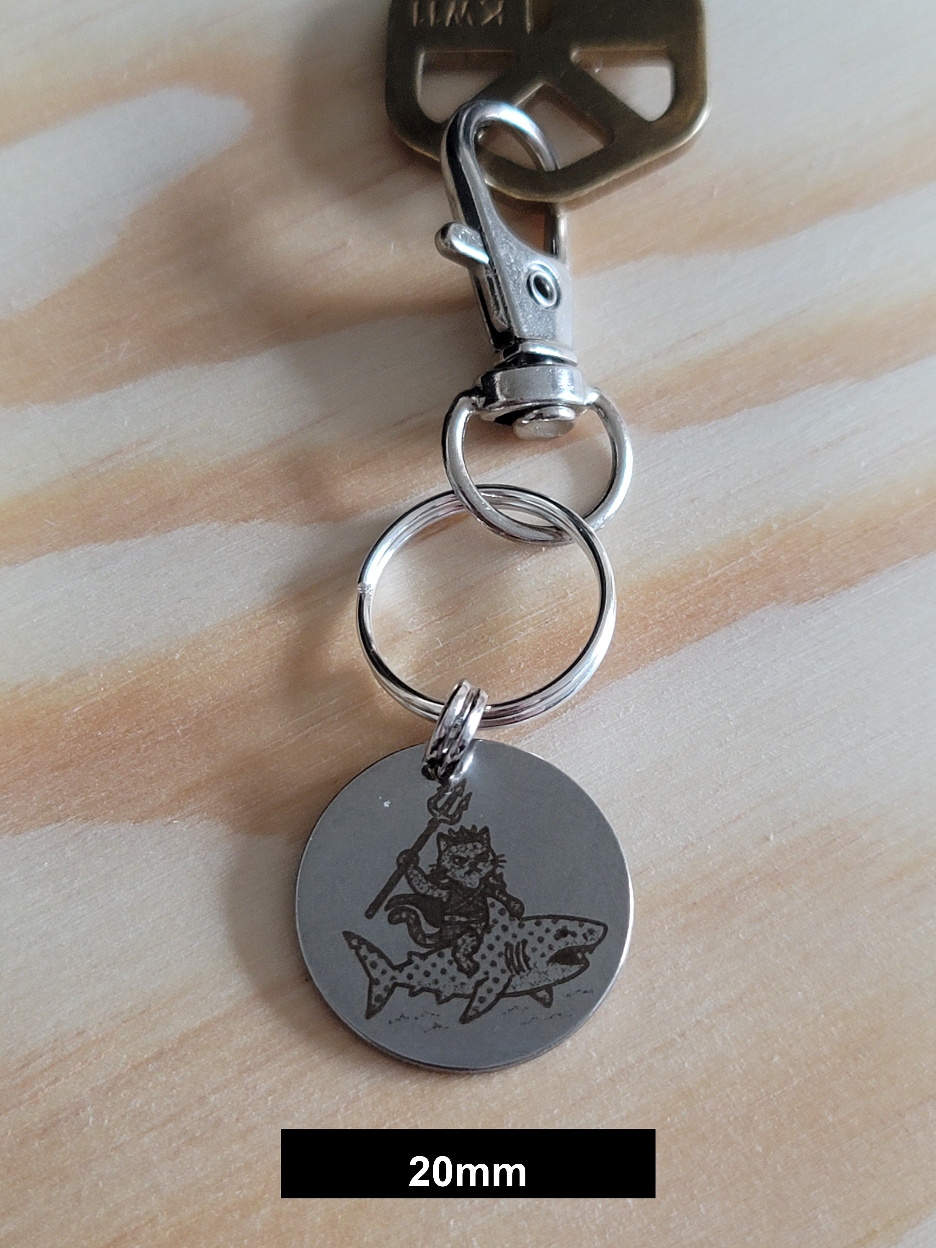 Misty on her shark at sea Engraved Fob