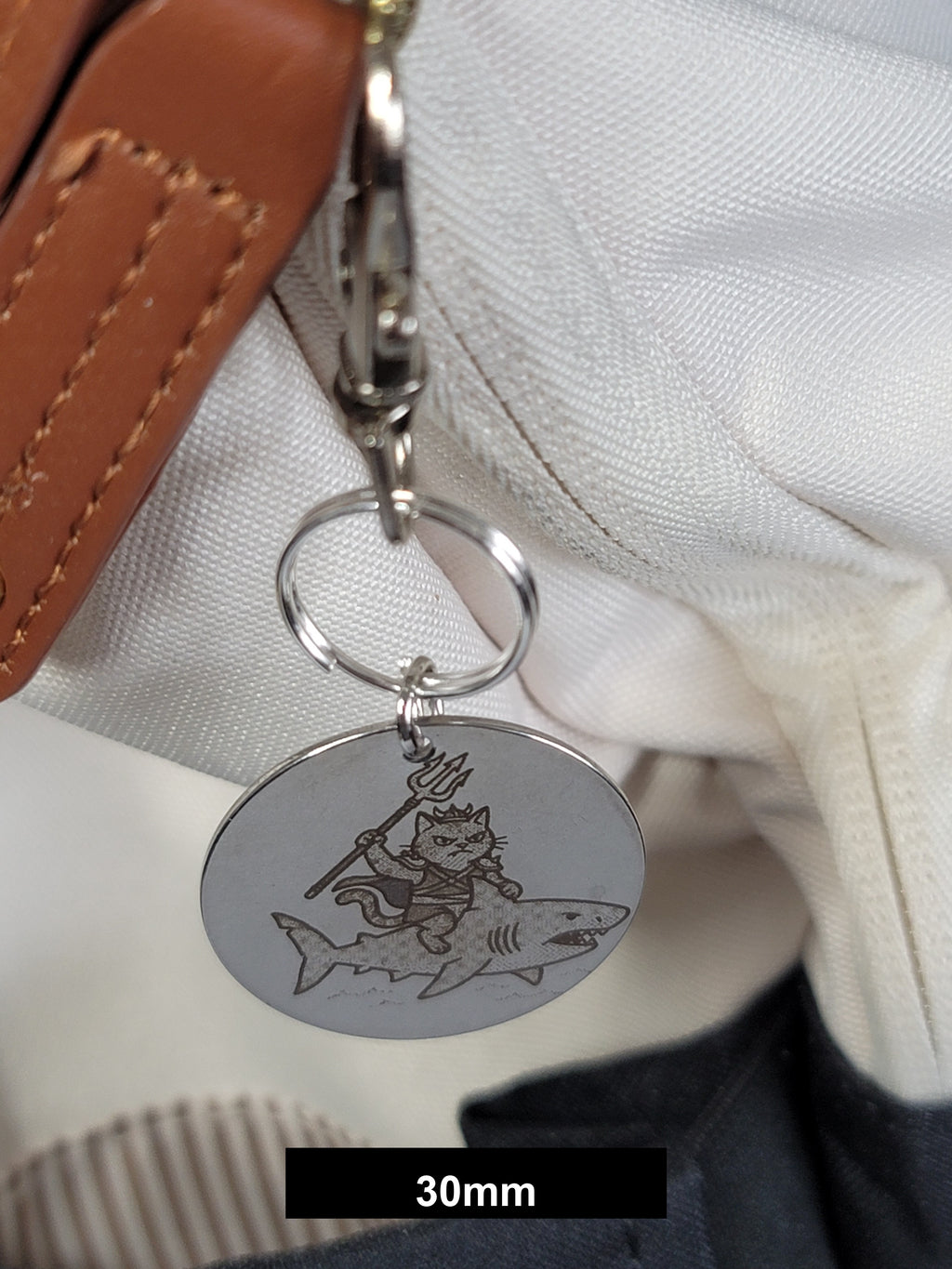 Misty on her shark at sea Engraved Fob