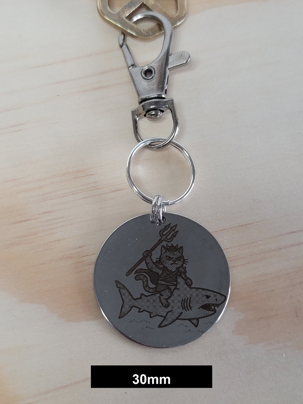 Misty on her shark at sea Engraved Fob