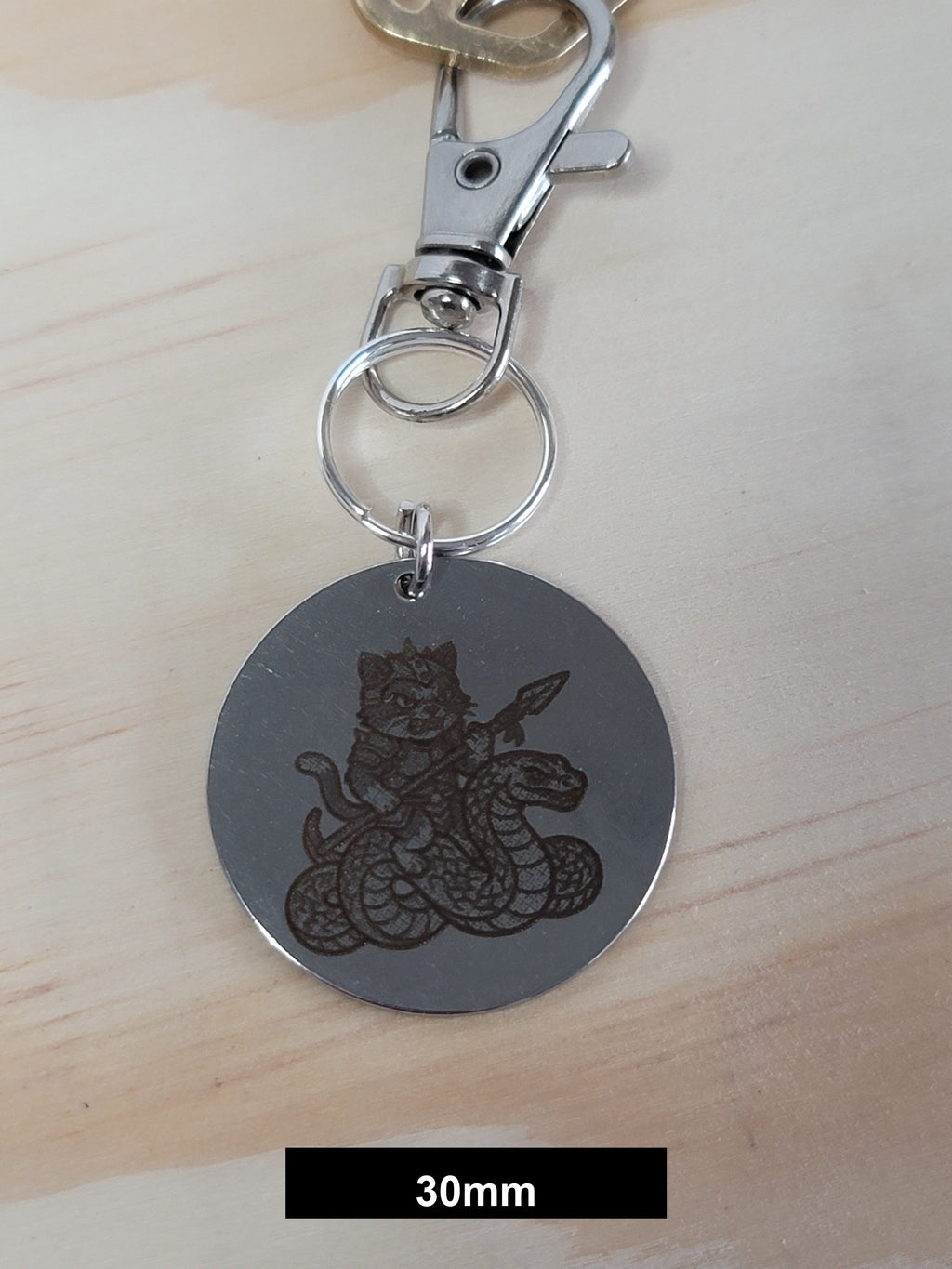 Captain Tom on his serpent Engraved Fob